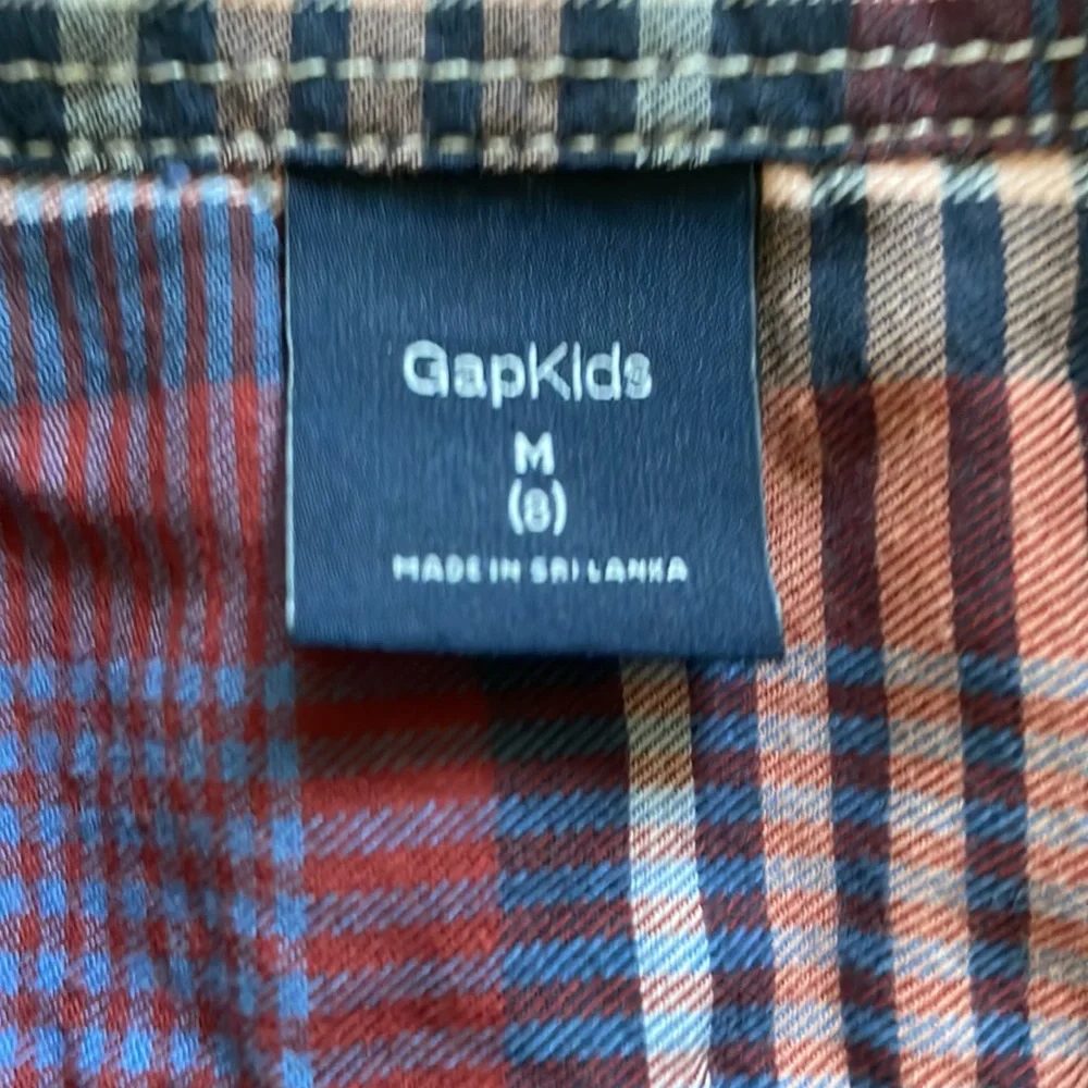 Gap kids burgundy, navy and white plaid button down, cotton shirt.  Boy’s medium